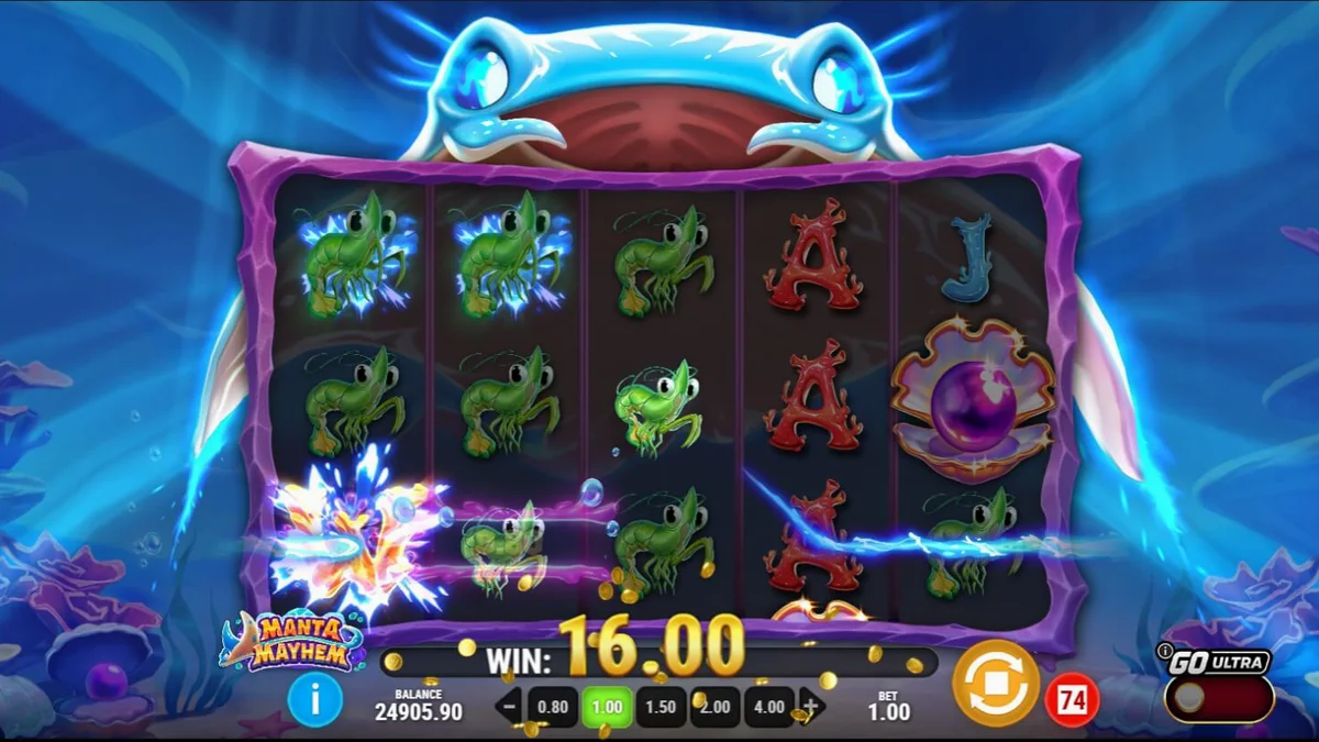 Tampilan visual slot Manta Mayhem dengan latar belakang terumbu karang dan manta ray.